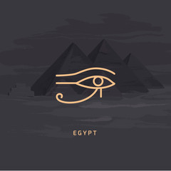 Vector illustration of the Udjat icon also the eye of Ra or the eye of Horus, the left falcon eye of the god Horus isolated on a vector background of the Egyptian pyramids handcrafted.