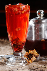 Tea is an aromatic beverage commonly prepared by pouring hot or boiling water over cured leaves of the Camellia sinensis. Tea originated in Southwest China during the Shang dynasty.