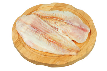 Pangasius fillet meat on a board on white isolated background