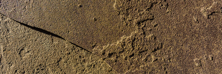 surface of fissured sandstone in the open air.