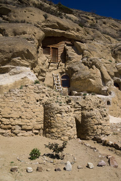 house in mountain cave