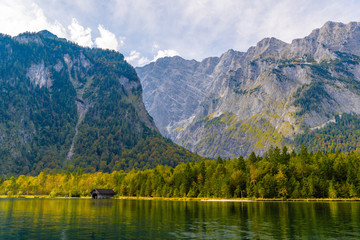 Wooden old fish house on the lake Koenigssee, Konigsee, Berchtesgaden National Park, Bavaria, Germany