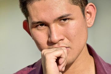 Obraz premium Handsome Filipino Male Deciding