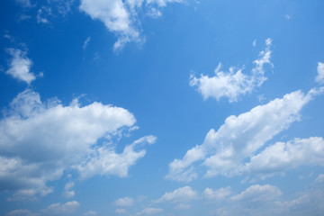 white clouds in the blue sky