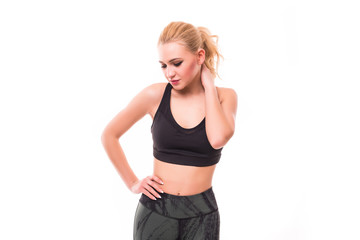 Fitness young woman with neck pain over white background