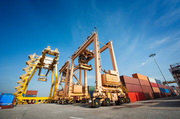 Transport logictic industry concept of cargo, truck, transportation, container box, vessel ship and working crane, import export business.
