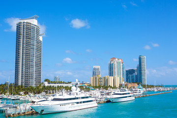 Fototapeta na wymiar Miami, Florida, USA downtown skyline. Building, ocean beach and blue sky. Beautiful city of United States of America