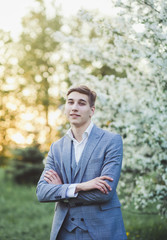 Portrait of smiling man in suit outdoors