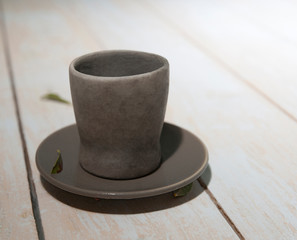 ceramic dishes: a cup and saucer