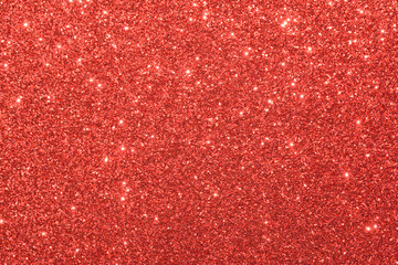 red glitter macro background. Close-up shot of glittery texture.
