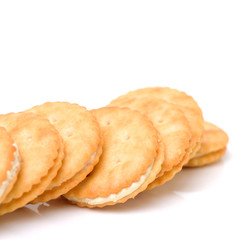 vanilla sandwich cookies on white background