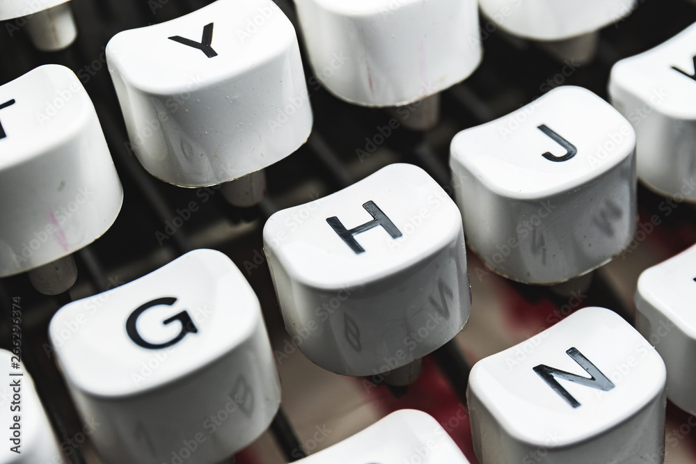 Fototapete typewriter characters whites details macro icon and letters on retro machine keyboard