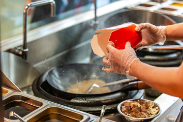 chef preparing food in kitchen