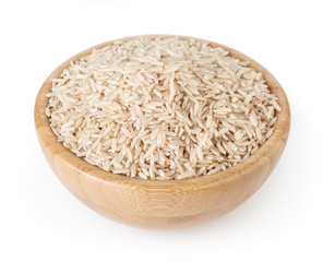Brown rice in wooden bowl isolated on white background with clipping path