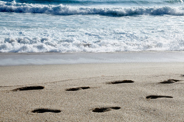 footprints on the beach