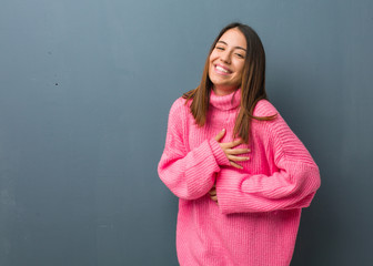 Fototapeta premium Young modern woman laughing and having fun