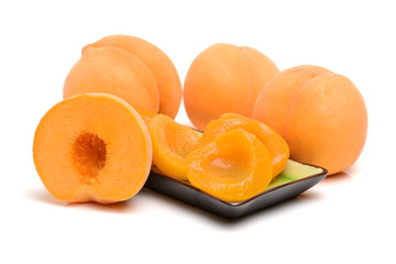 peaches in syrup on a white background 
