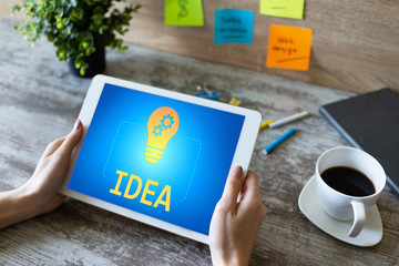 New idea, creativity and innovation concept with lamp icon on screen.