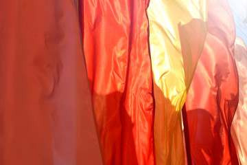 May 9, Victory Day. Red and yellow flags in the square.