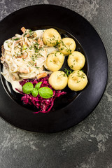 Chicken salad with potatoes, restaurant serving portion