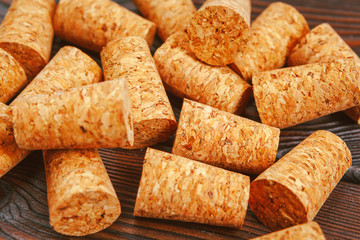 Wine corks on wooden background