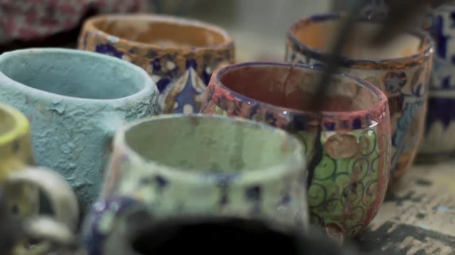 Closeup Of Paint Cups In A Creative Pottery Studio. Multan Pottery Art, Pakistan.