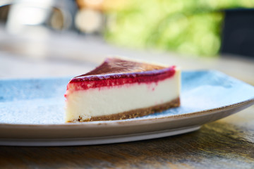 Delicious raspberry cheesecake on the table