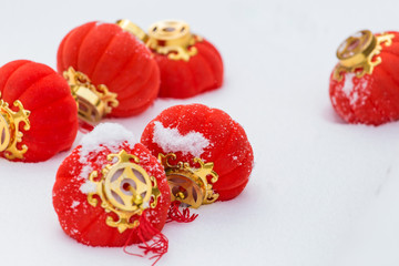 Red lanterns in the snow
