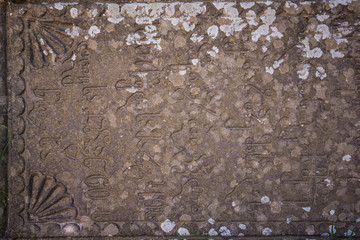 medieval stone engraving in georgian letters