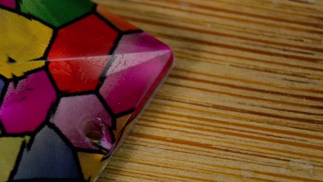 A single colorful diamond rotating slowly