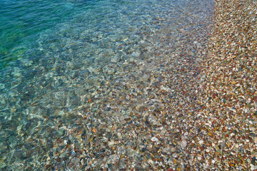 Pebble stone and sea background