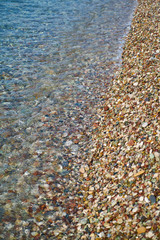 Pebble stone and sea background