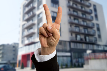 Agent showing victory sign