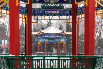 There is a pavilion in the snow in winter
