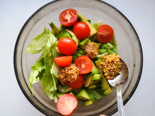 Seasoning for vegetable salad, adding French mustard to vegetable salad, Vigatarian food, healthy...
