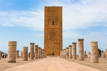 Tour Hassan tower in the square with stone columns. Made of red sandstone, important historical and...