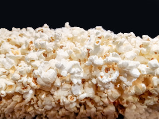Popcorn texture background for retouch . salty popcorn in the box .