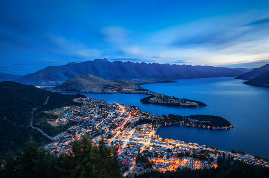 Queenstown City Lights from the top of the Skyline Mountain. The alpine city sits on the shore of Lake Wakatipu, Otago Region, Southern island, New Zealand.