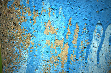 Old blue paint on concrete. Smudges. Texture of stone, photophone or background.