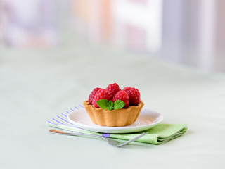Fruit raspberry cakes on a table