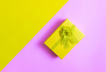 Gift box on festival day yellow and pink background