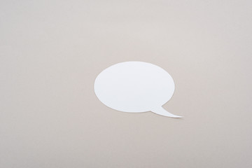 white blank speech bubble with copy space on grey background