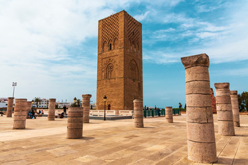 Tour Hassan tower with stone columns in the square - Hassan Tower or Tour Hassan is the minaret of an incomplete mosque in Rabat, Morocco