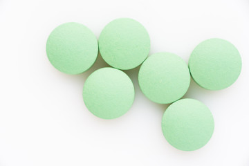 Pills on a light background close up. View from above.