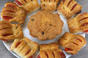 Still life with sweet pastries on a white plate