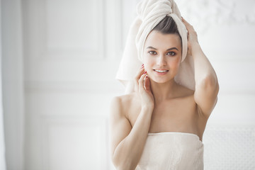 Young attractive woman after bathing