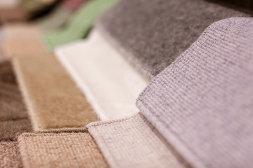 Colorful carpet samples in the store