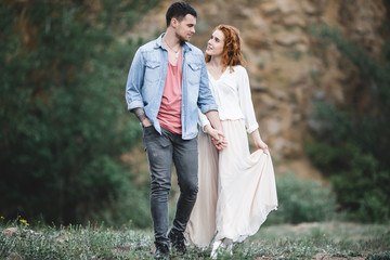 Portrait of a happy young couple enjoying a day in the park together