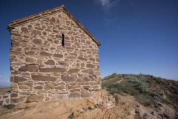 Fototapeta na wymiar medieval chapel on hilltop