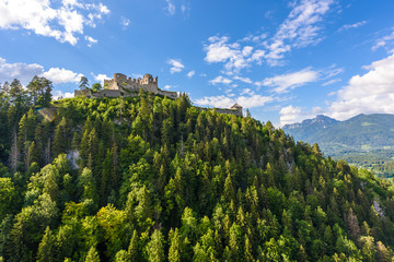 Fototapeta na wymiar Suspension Bridge at Reutte between two hills in beautiful landscape Scenery of Alps, Tirol, Austria